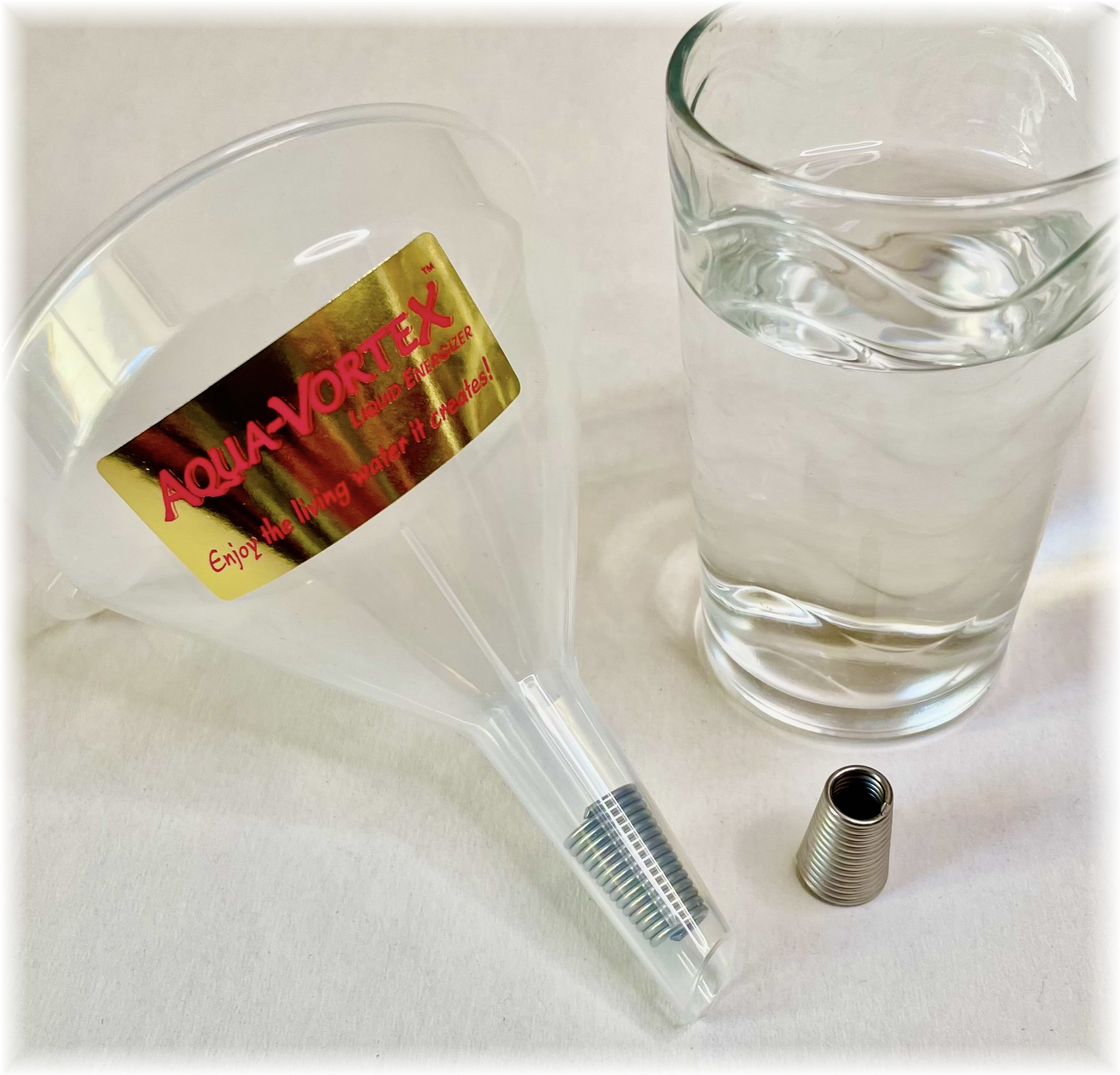 AQUA-VORTEX stainless-steel water energiser with funnel and glass of water